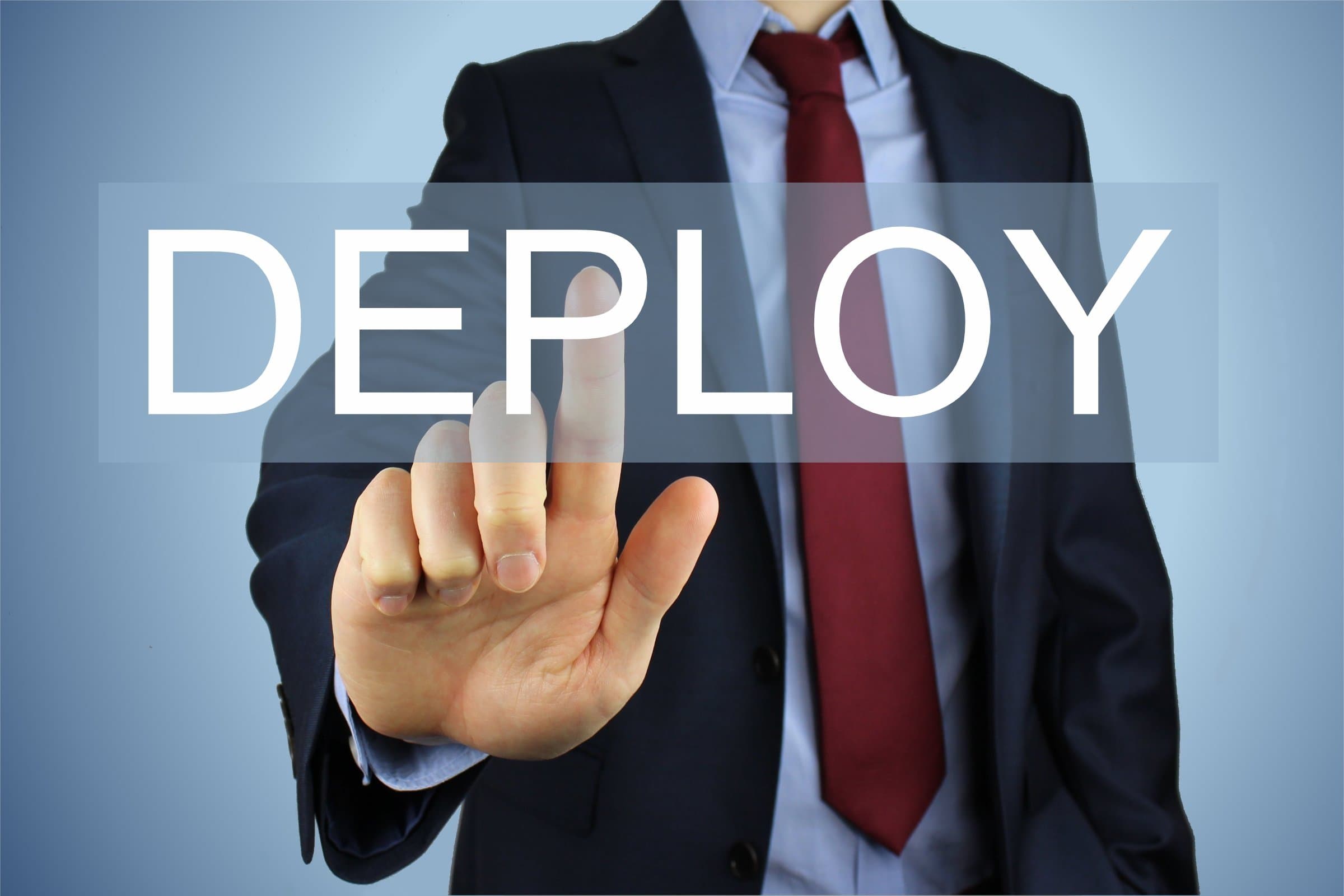 A person touches a bottom that is deploy.